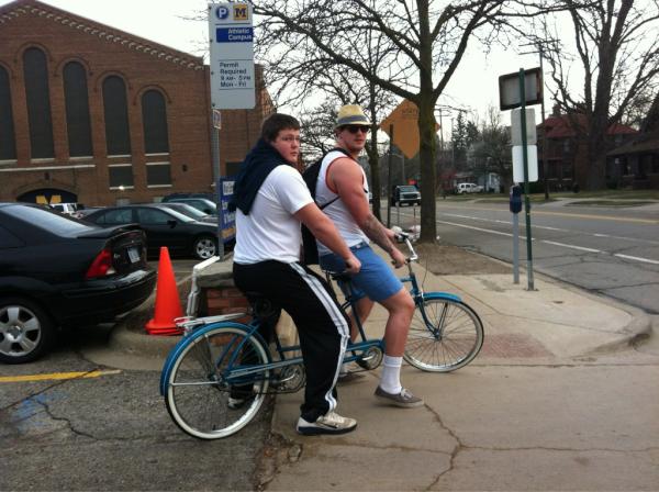 Picture of Lewan and Glasgow on Tandem Bike, 1 fedora per group